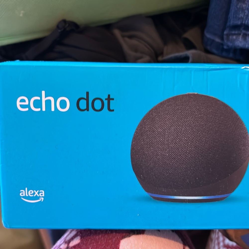 New Echo dot. Never used in original box. Taped closed.
